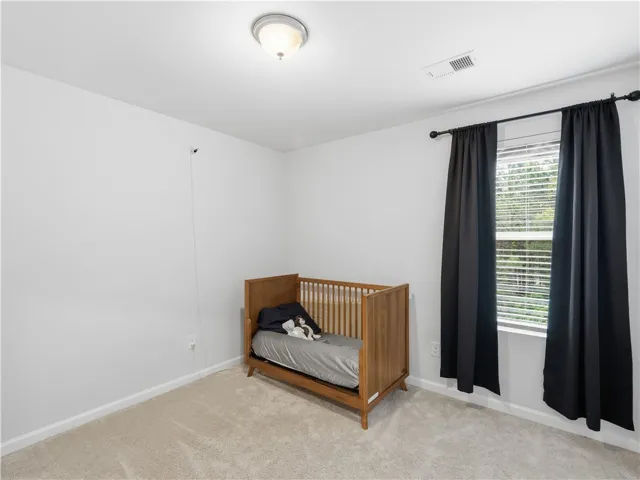 Bright and airy, this room offers a serene atmosphere perfect for relaxation.
