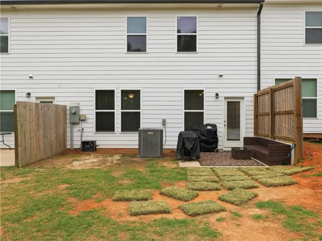 This outdoor space offers a private retreat perfect for relaxation or entertaining.