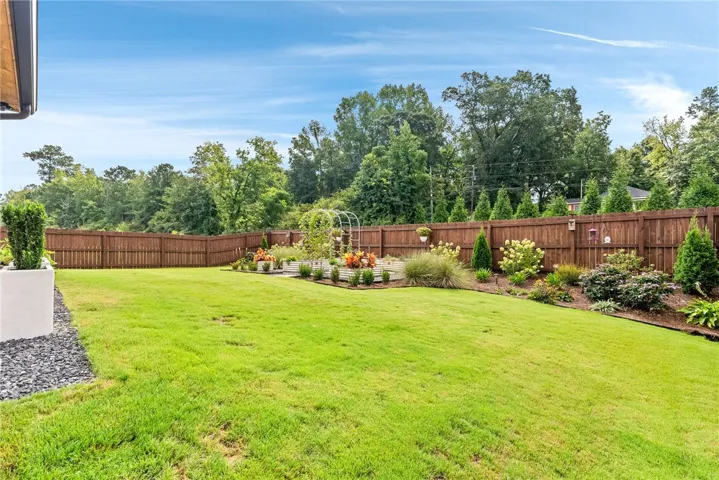  Birds and butterflies delight in this garden curated to shine year round.