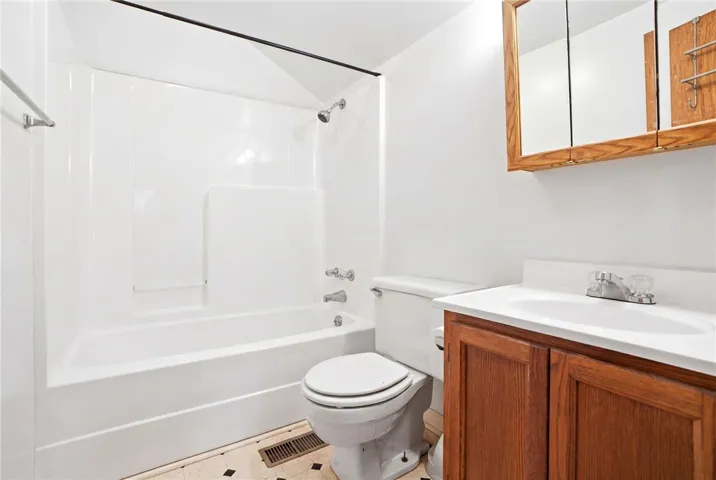 This bathroom provides essential amenities for comfortable daily routines.