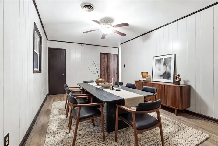 This dining area offers a bright and inviting space perfect for entertaining guests. (Rendering)