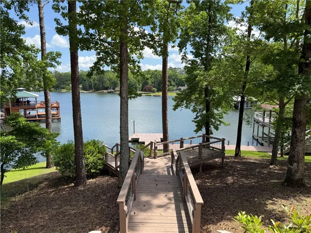 This outdoor space provides serene waterfront access and a private boat dock for leisure.
