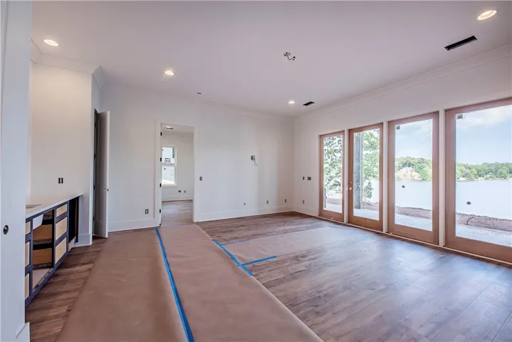 This bright space offers ample natural light and waterfront views.