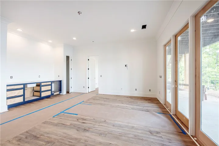 This bright, spacious room with wood flooring awaits your personal touch.