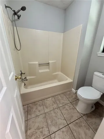 This bathroom offers practical amenities for daily living.