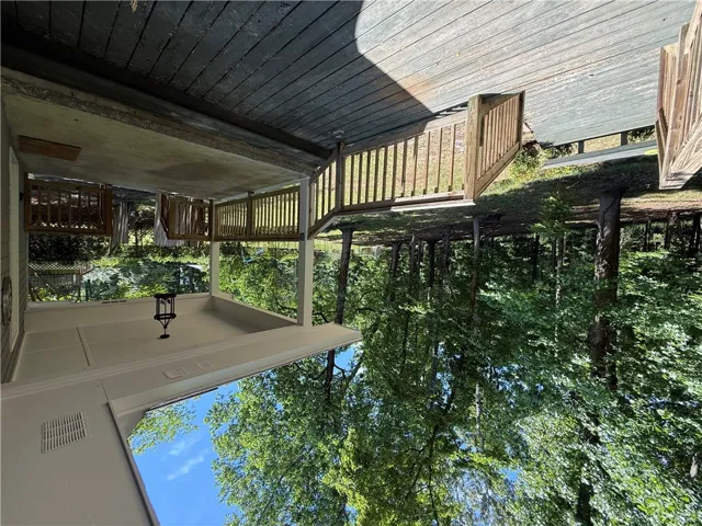 This elevated outdoor space offers treetop views, perfect for peaceful moments.