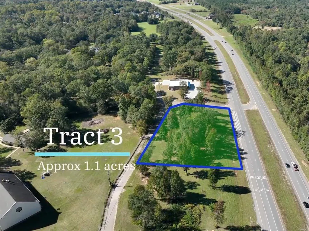 Expansive lot with direct highway access offers significant development potential.
