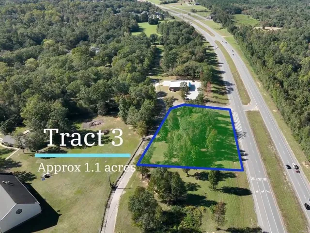 Expansive lot with direct highway access offers significant development potential.