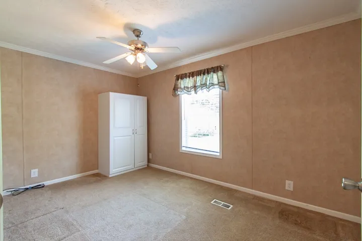 Mobile Home Flex room with carpeted flooring can be used as your heart desires.