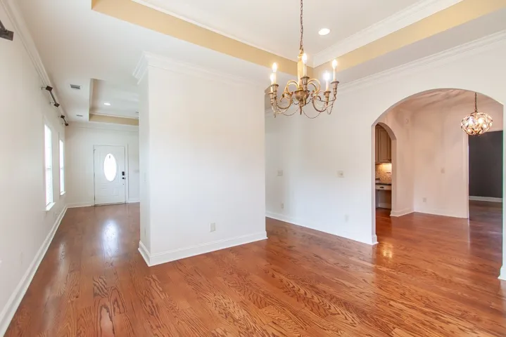 This is the formal dining room.  Note the trey ceiling and arched doorways.