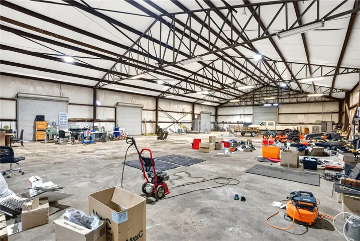 This spacious interior offers an expansive area, ideal for diverse operational needs.