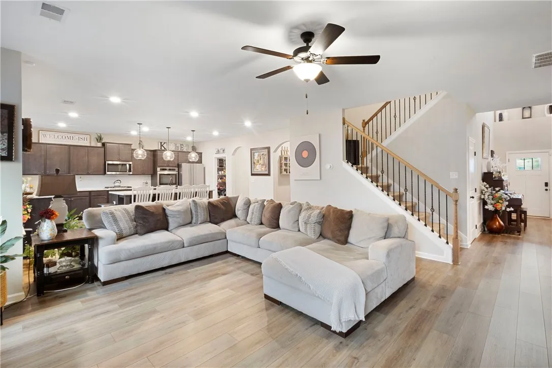This inviting space features an open layout with lvp floors and ample natural light.