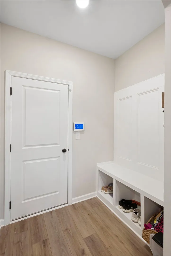 This entry offers functional built-in storage, perfect for organization.