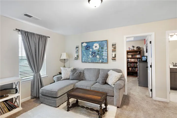 This inviting loft features a seamless flow, ideal for both relaxation and everyday living.