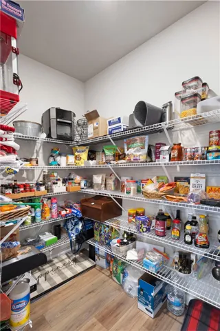 This spacious pantry provides abundant storage, making organization effortless.
