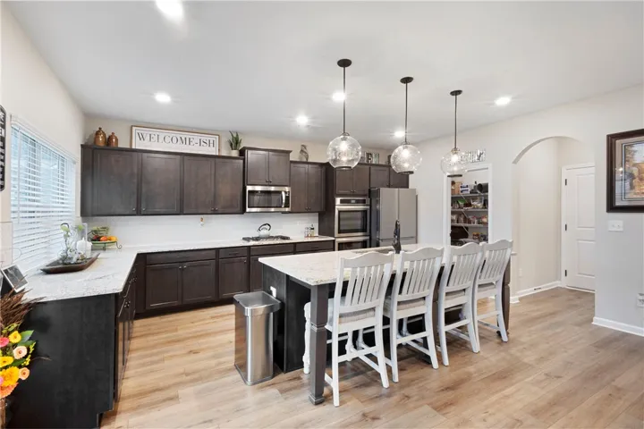 This kitchen offers an ideal space for daily living and culinary exploration.