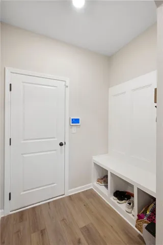 This entry offers functional built-in storage, perfect for organization.