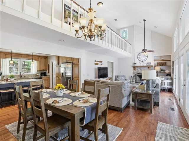 This inviting space combines comfortable living with a well-appointed kitchen for seamless entertaining.