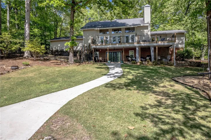 This spacious home boasts an expansive outdoor area, perfect for enjoying nature and fresh air.