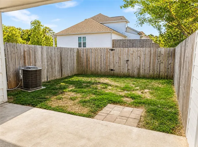 This private yard offers a tranquil retreat for outdoor enjoyment and relaxation.