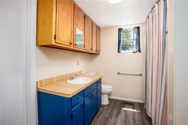 Functional bathroom with ample storage and easy-care surfaces.