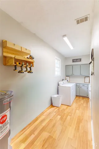 Bright and airy, this utility room provides an efficient space for household tasks.