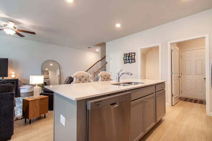 This bright kitchen with a large island creates an inviting and functional central gathering space.