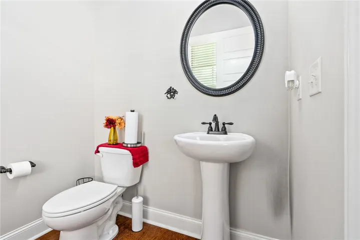 This clean and functional bathroom offers essential amenities for daily routines.