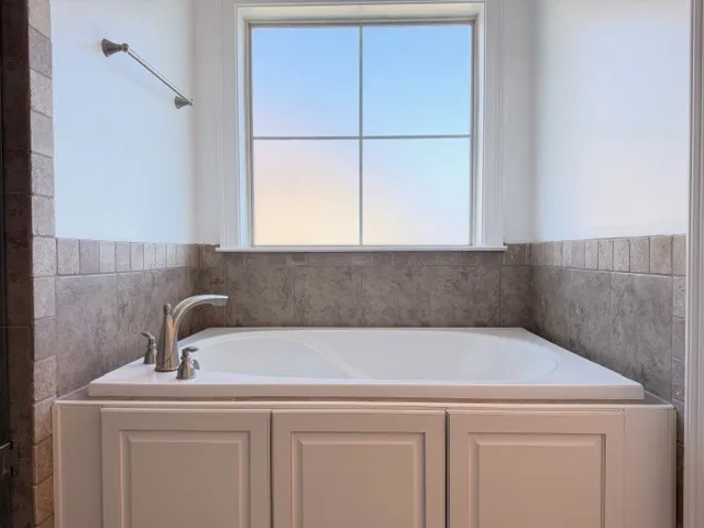 Relax in this tranquil bathing space, a perfect sanctuary within the home.