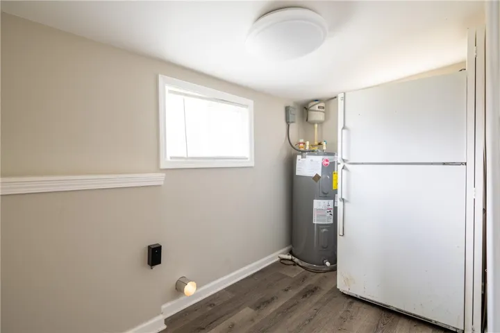 This functional utility room offers essential amenities for daily living.