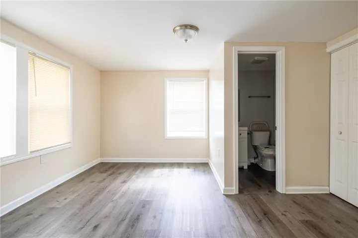 This versatile space features durable flooring and ample natural light, ideal for any lifestyle.