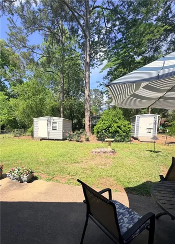 Large yard, back portion wooded