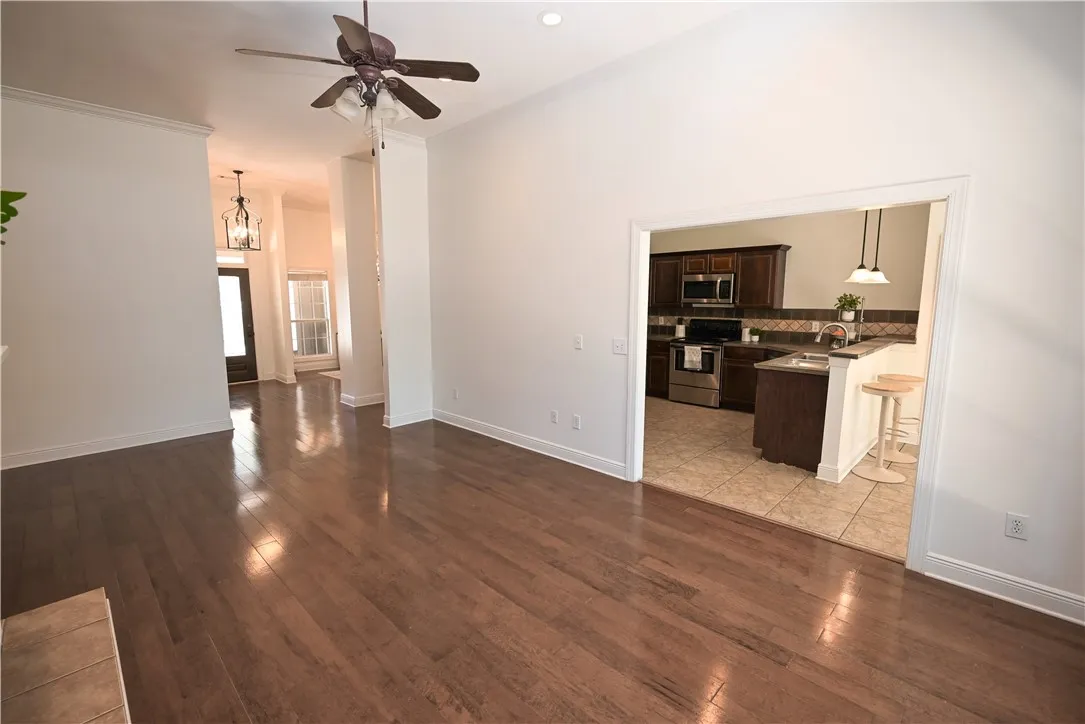 Great room flows into kitchen and breakfast area.