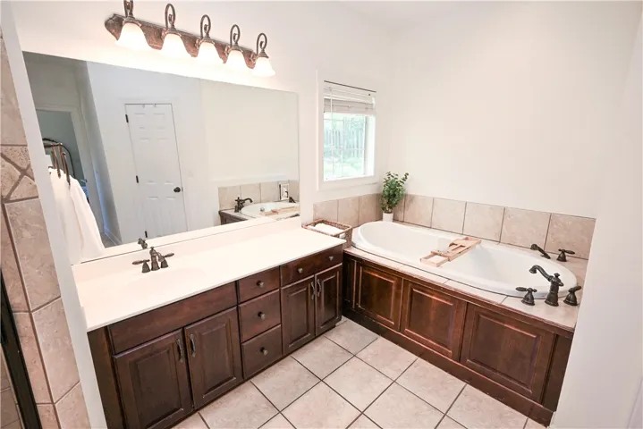 Extra deep soaking tub with dual heads for ultimate relaxation!