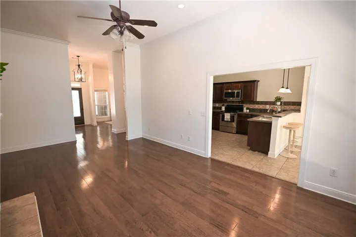 Great room flows into kitchen and breakfast area.