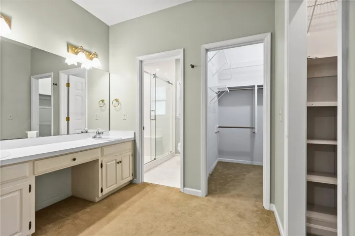 2 of 3 closets in primary