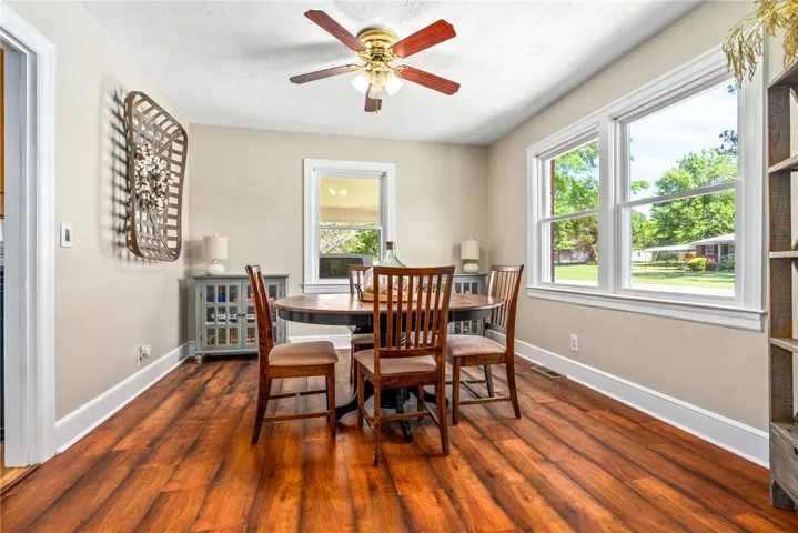 This bright dining area features ample natural light and durable flooring, ideal for everyday living.