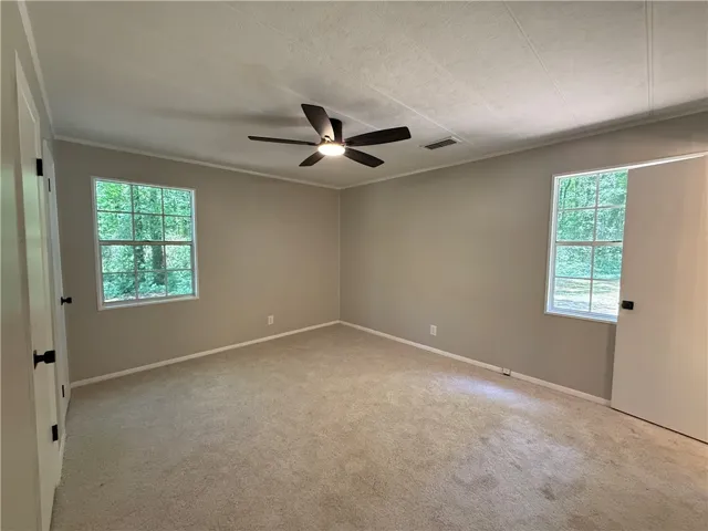 Bright and airy, this tranquil room offers peaceful tree views through its ample windows.