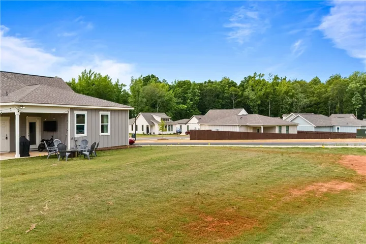 This spacious backyard offers a perfect setting for outdoor enjoyment and tailgating and BBQs with family and friends.