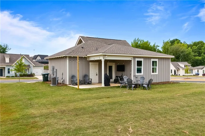 This house features a charming patio perfect for outdoor enjoyment and relaxed gatherings.