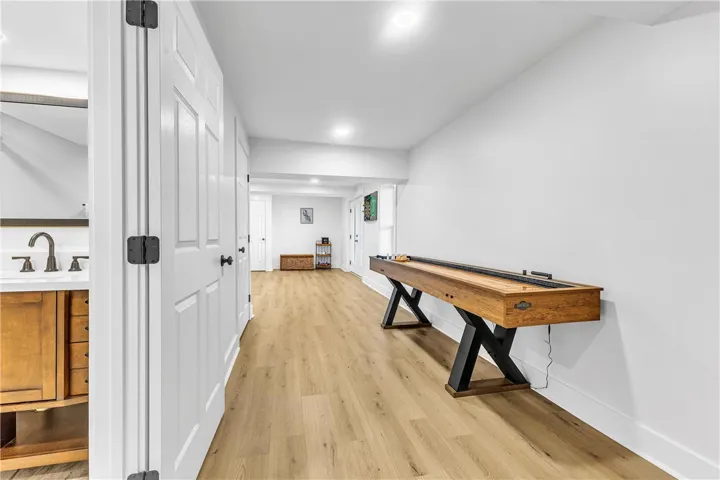 This versatile basement space offers abundant possibilities for recreation and relaxation.