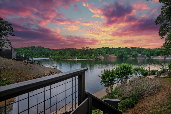 This scenic lakefront property offers serene water views and a peaceful, natural environment.