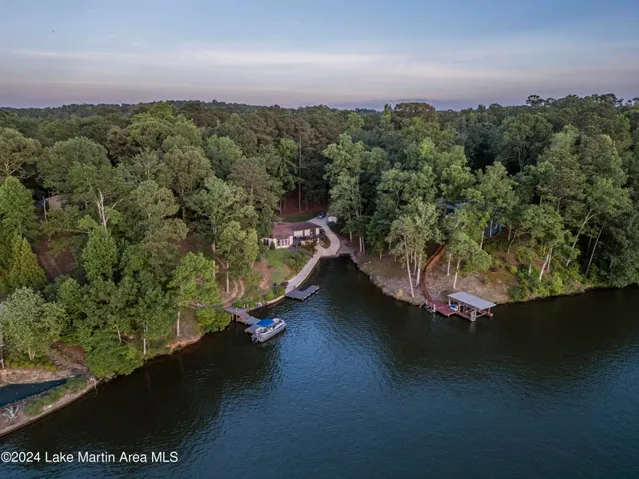 This captivating lakefront property offers serene views and private water access, perfect for tranquil living.