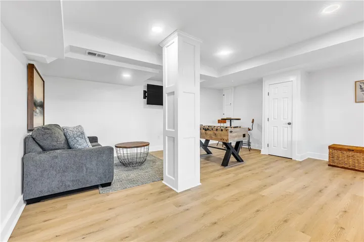 This versatile basement space offers a perfect blend of relaxation and recreation, ideal for entertaining guests.