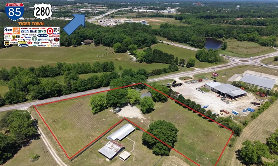 Expansive acreage with prime visibility and easy access, offering a blend of rural charm and commercial potential.