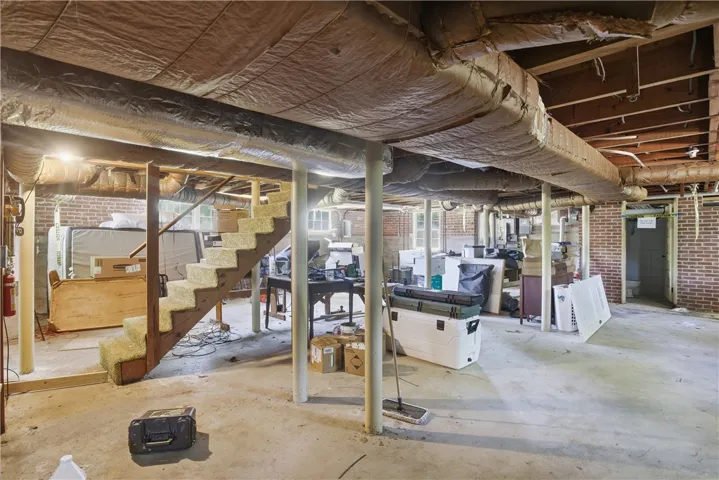 The spacious unfinished basement offers ample storage and potential for future customization.