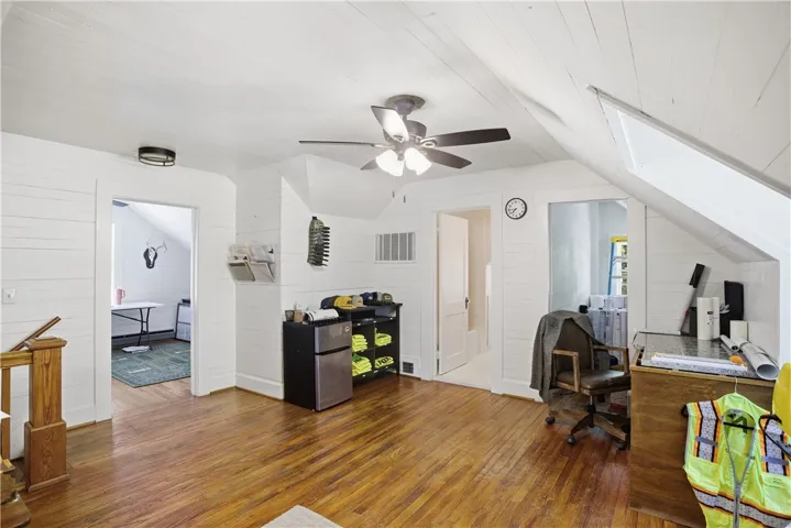 This versatile bonus room offers ample space, bathed in natural light, perfect for diverse activities.