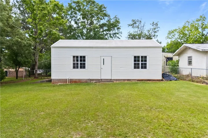 This versatile outbuilding offers ample storage or flexible space for various needs.