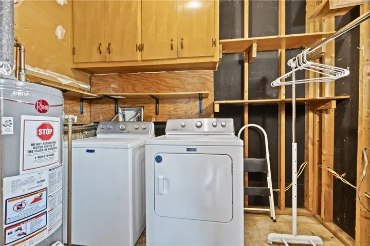 Functional utility space with essential laundry appliances for everyday convenience.