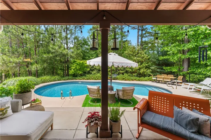 This tranquil outdoor area features a refreshing pool, perfect for relaxation and entertaining.